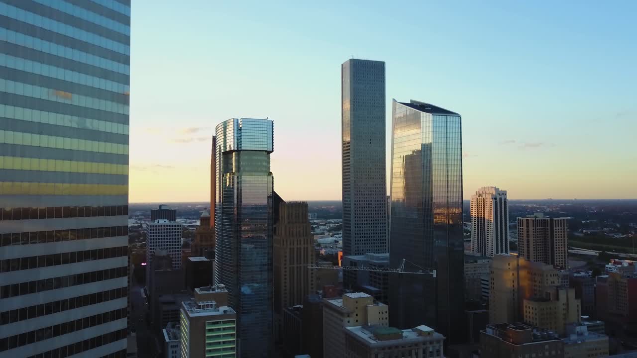 Drone Aerial View of Downtown Houston, Texas USA. Modern Skyscrapers in Financial District Under Sunset Sunlight