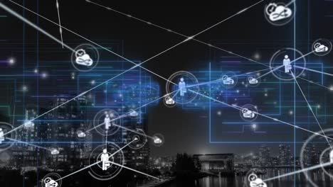 Animation of network of digital icons and blue light trails against aerial view of night cityscape