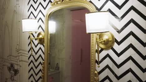 a sophisticated mirror showcased within a lavish room - close up