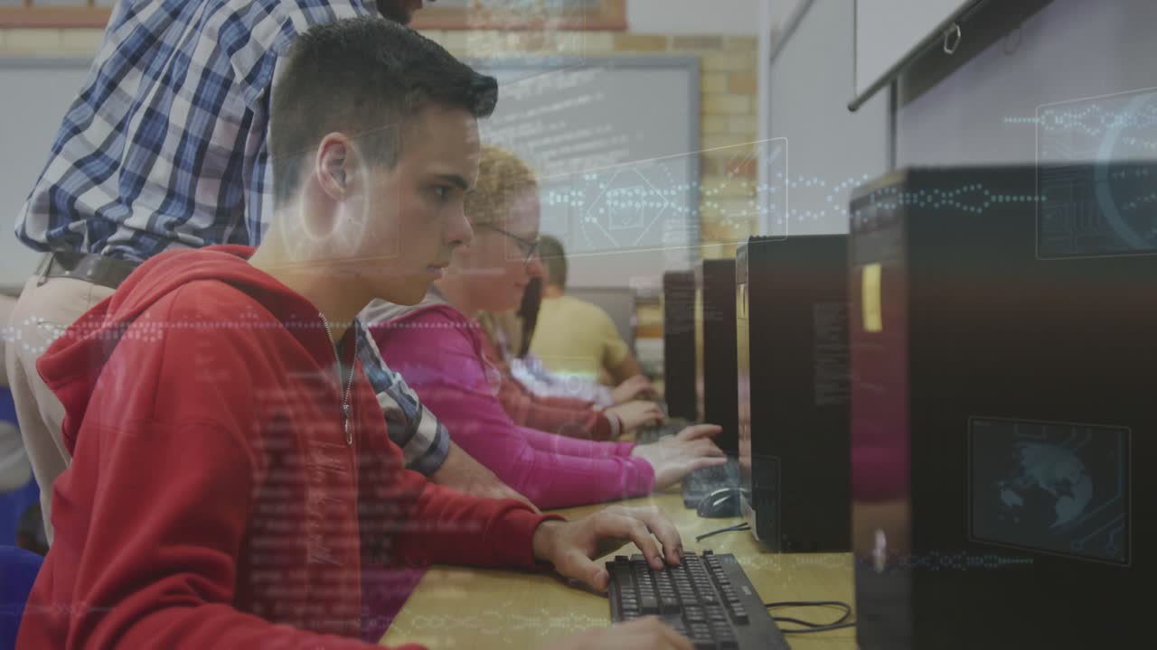 Male teenager typing while instructor walking row and leaning to assist, overlays aiding education