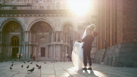 wedding day. beautiful couple in venice. saint mark square.