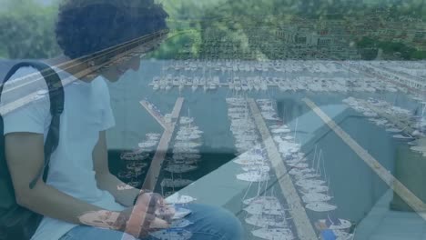 animation of man using smartphone over boat dock