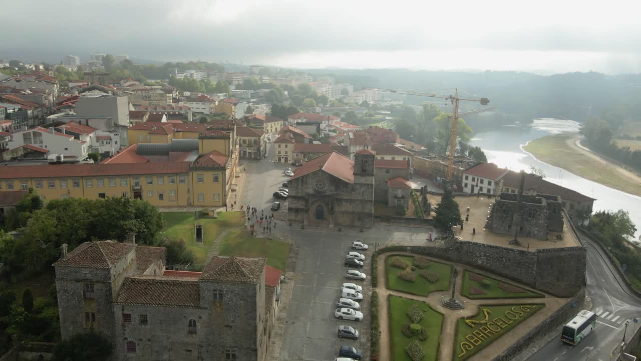 aerial - Barcelos castle gardens with river view under cloudy skies