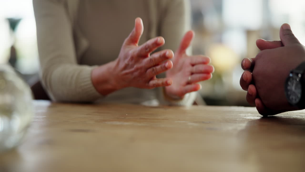 Hands of people in a conversation
