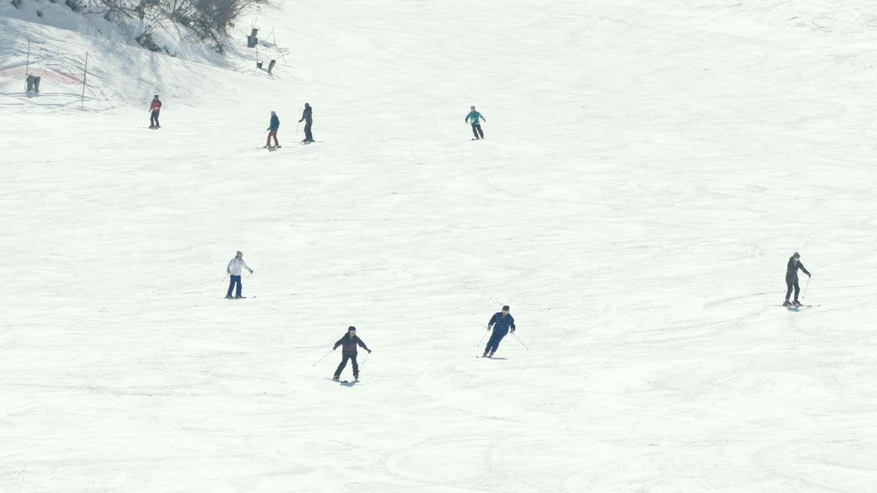 People Skiing And Having Fun At Ski Resort In Okuhida Hirayu, Gifu, Japan