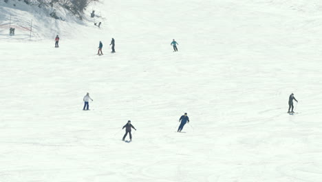 people skiing and having fun at ski resort in okuhida hirayu, gifu, japan