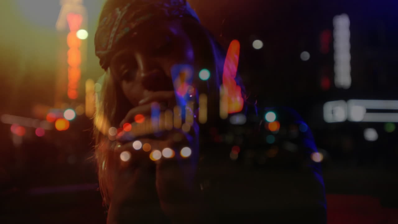 Woman holding cigarette in downtown marketing shoot, neon bokeh blending with animated graph icons