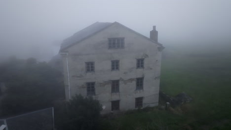 abandoned house in fog