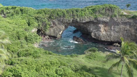 stone arch at la hondonada coast in samana peninsula, dominican republic