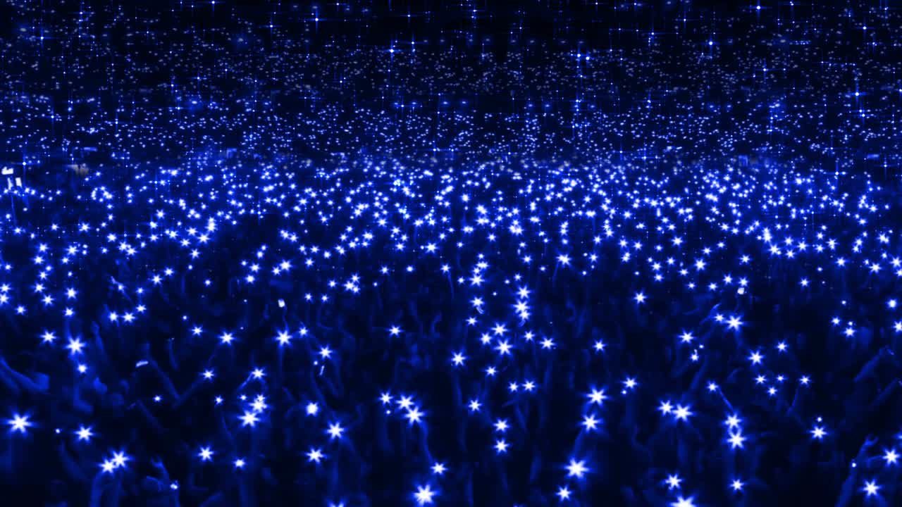 스타디움의 불빛 - 쇼에서 손에 불을 들고 있는 사람들의 무리를 모방하는 애니메이션 - 콘서트 플래시 모브 - 라이트 드폰의 배열 - 루프