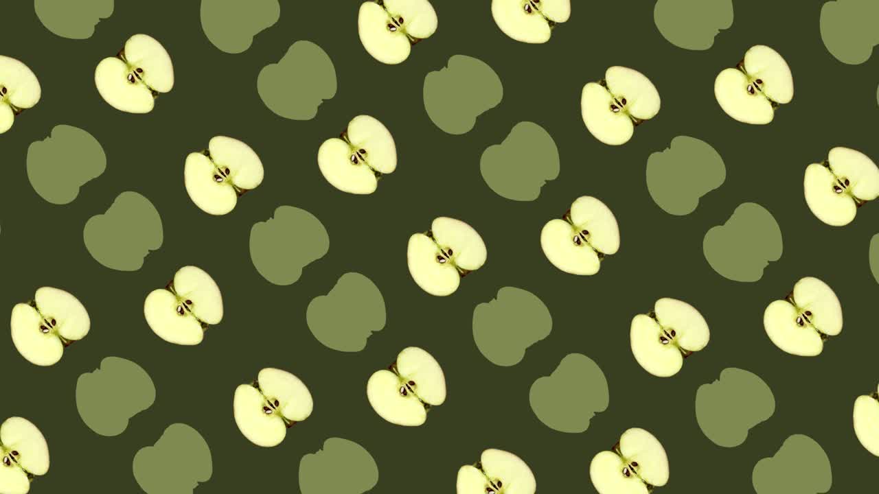 Farverigt mønster af friske æbler. Set fra oven. Sømløst mønster med æbleskiver. Pop art-design. Realistisk animation. 4K video motion