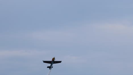 planes execute complex maneuvers in cloudy skies