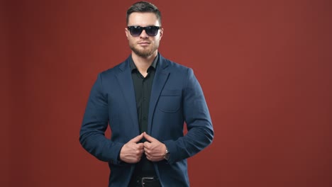 man posing on studio background. portrait of handsome man in glasses