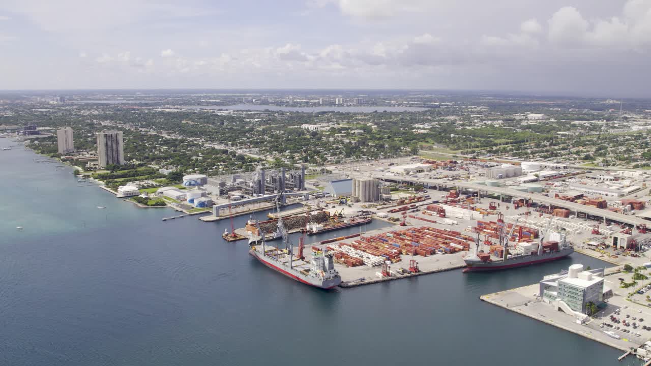 Aerial view of coastline and boat shipping harbor