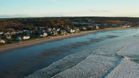 aerial shot of maine beach at dawn