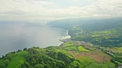 miradouro dos picos dos bodes coastline and lush greenery in azores portugal, aerial view