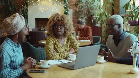 African American Colleagues Having Meeting in Cafe