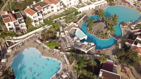 aerial-view-of-fuerteventura-resort-in-canary-island-spain,-swimming-pool-and-private-rooms-for-rent