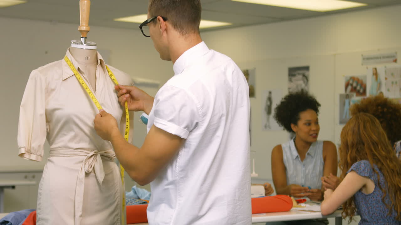 Fashion students having a meeting together 