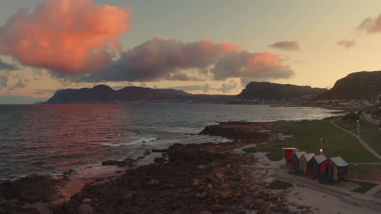 Stunning Sunset over Rocky Coastline and Ocean