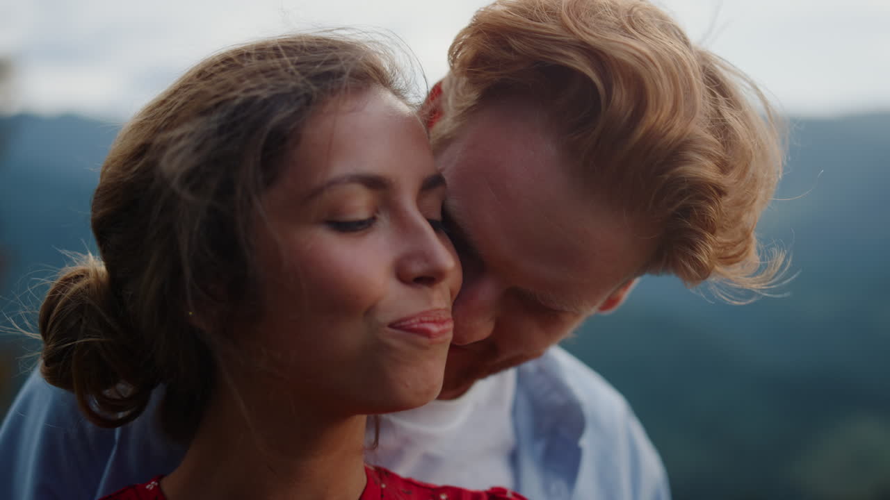 Love couple dating meadow closeup. New marriage caressing each other mountains