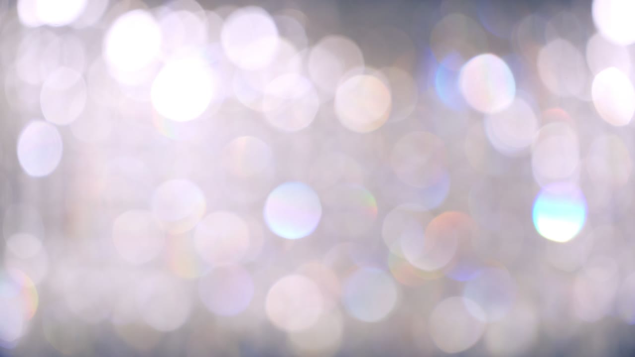 Abstract bokeh lights with soft light background, Bokeh blurred of Chrystal chandelier.