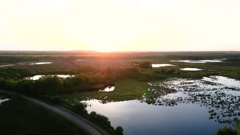 sunset over a wetland landscape