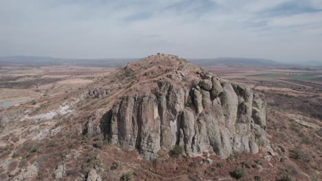 a great rock on a hill