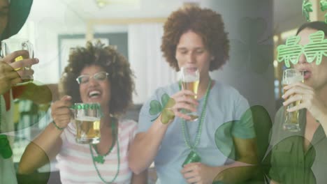 Animation-of-clovers-over-diverse-friends-smiling-and-drinking-beer