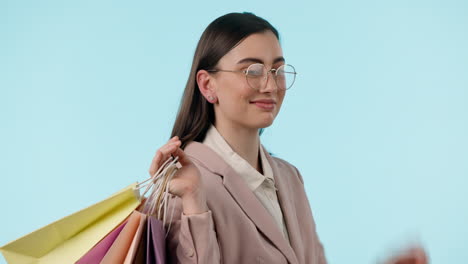 Cara,-Gafas-Y-Mujer-Guiñan-Un-Ojo-Con-Bolsa-De-Compras