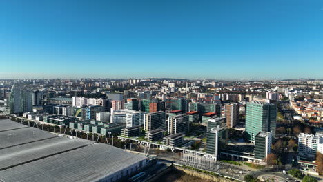 establishing drone shot of condos in the parque das nações district, in lisbon