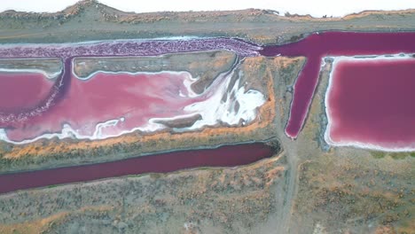 Top-Down-Abstract-Aerial-View,-Pink-and-Purple-Ponds-For-Mineral-Industrial-Use