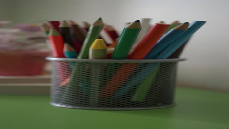 colored pencils in a holder