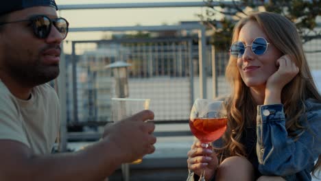 Young-couple-spending-time-together-at-the-roof-top.