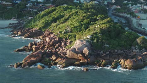 Aerial-view-of-natural-pools-on-rocky-coastline-of-Barra-da-Lagoa,-beautiful-landscape-in-Florianópolis,-Santa-Catarina,-Brazil