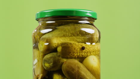 pickled cucumbers in a glass jar