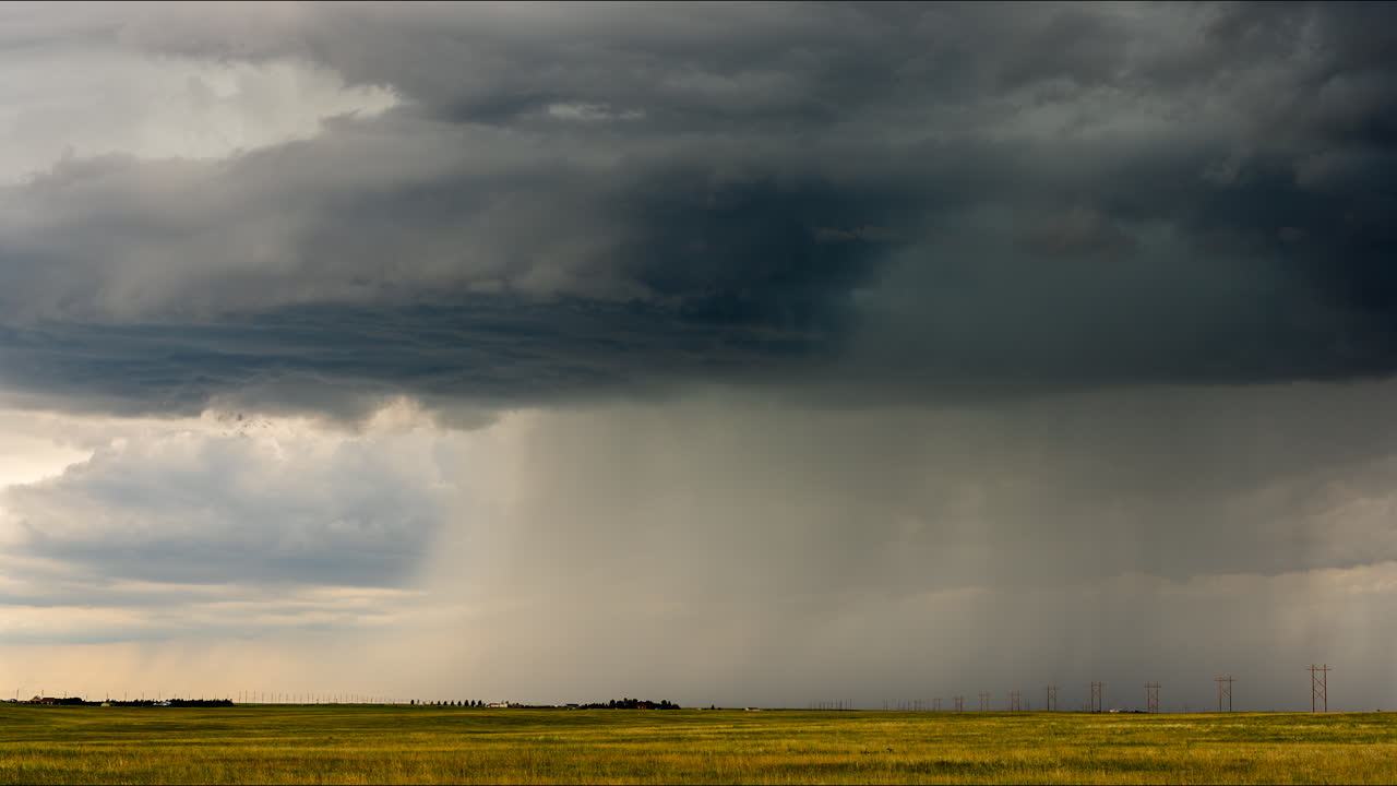 Stormy Landscape with Rain and Power Lines