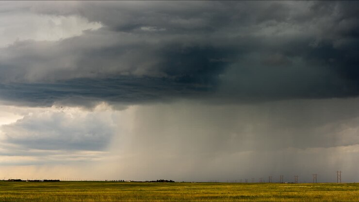 Stormy Landscape with Rain and Power Lines