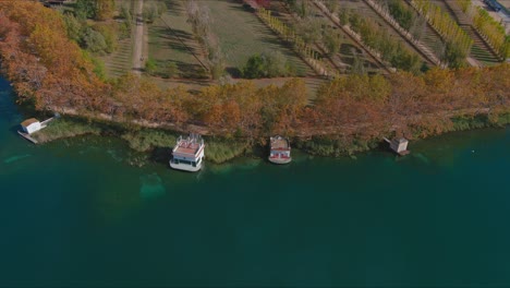 Les-Pesqueres,-Fishing-Shacks-on-Lake-Banyoles-in-autumn-season-Girona