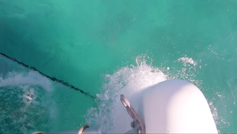 Sailing-boat-going-fast-on-green-water-in-the-Caribbean