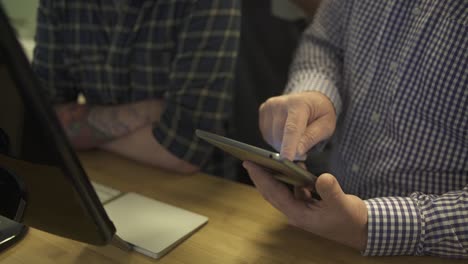 location footage of people using computer technology in daily business and office work