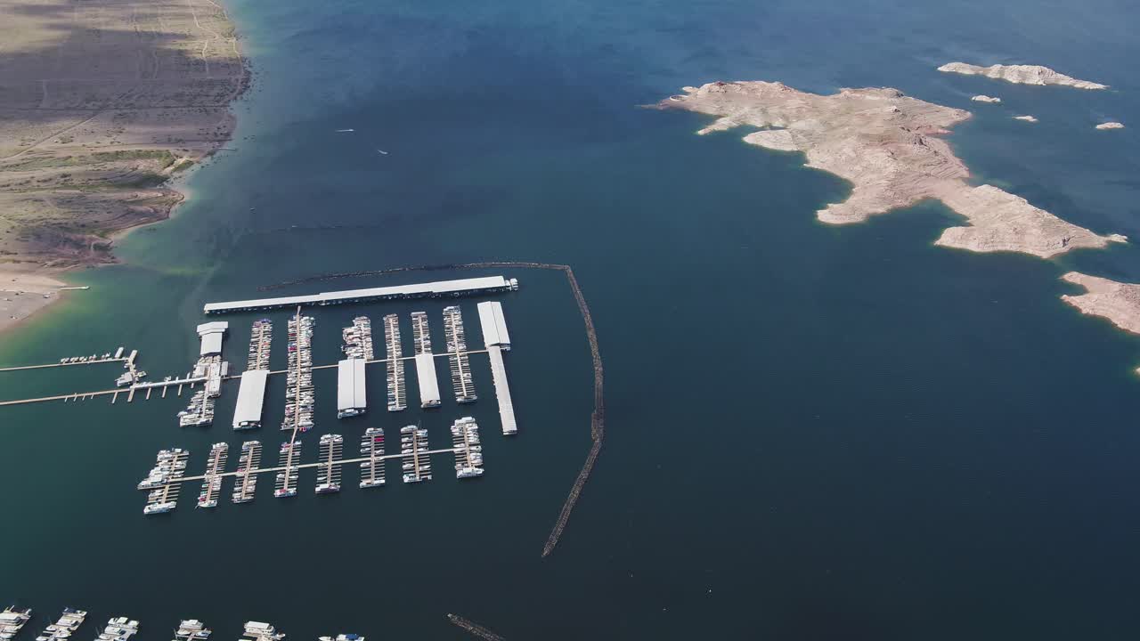 A high-flying drone shot over Lake Mead, a massive reservoir formed by the Hoover Dam on the Colorado River, that lies on the border of Arizona and Nevada, just east of Las Vegas