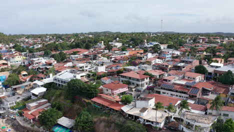 AERIAL---Residential-sector-near-Pipa-beach,-Rio-Grande-do-Norte,-Brazil,-circle-pan