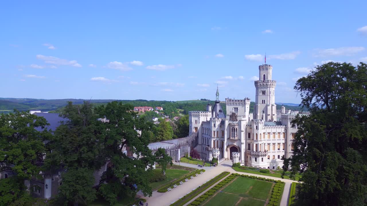 Majestic aerial top view flight Hlubok&aacute; Nad Vltavou is a Fairy tale castle in Czech Republic Europe, summer day 2023