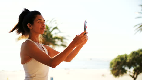 Woman-taking-selfie-in-balcony-4k