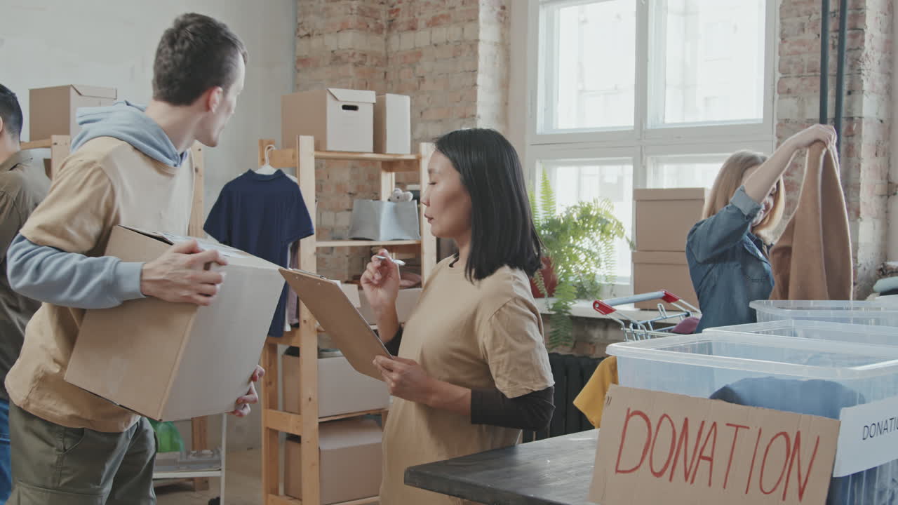 Team of Volunteers Sorting out Donations