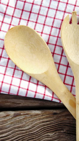 wooden spoon and fork on table