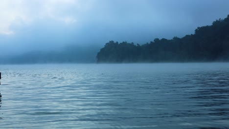 foggy river scene with mountains in chiang mai