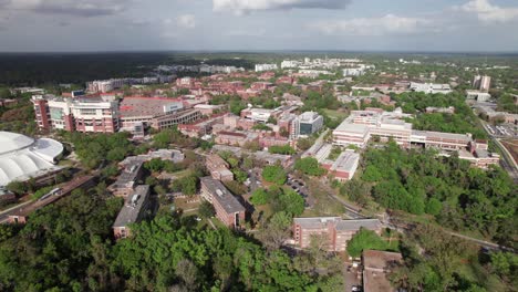 university of florida gainesville campus, long high drone shot with rich colors, 4k