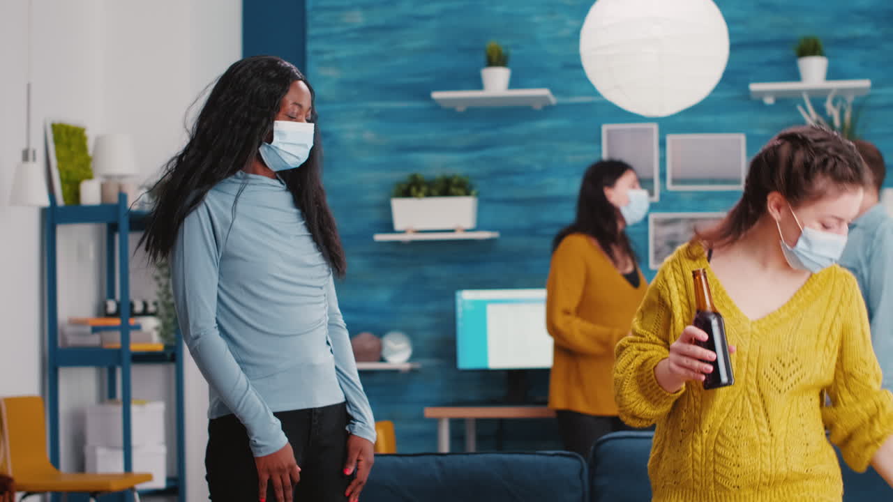 Happy cheerful friends touching elbow keeping social distancing